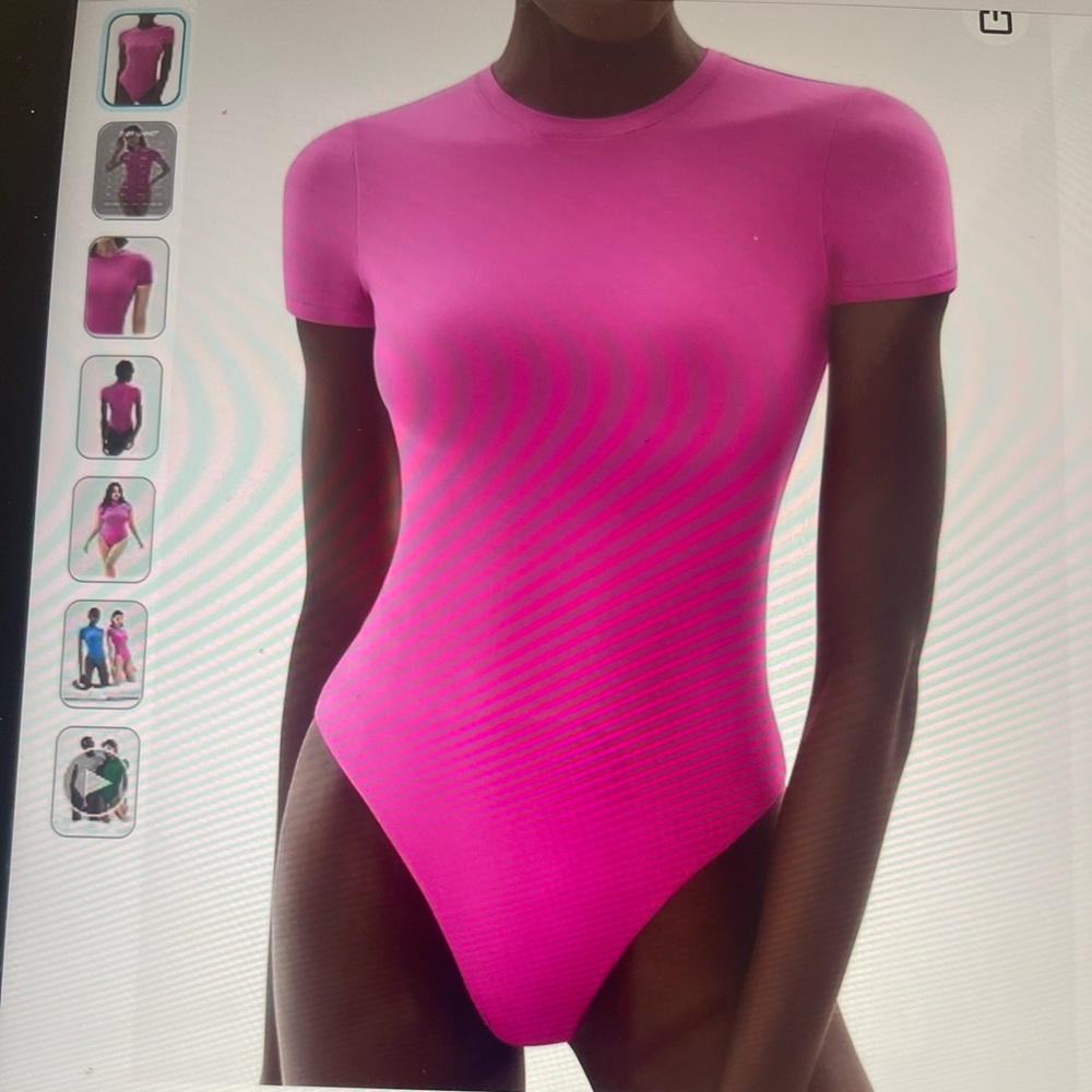 NWT Pink bodysuit. Size small